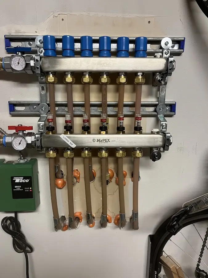 Plumber performing Water Heater Repair at a residential property in Galion